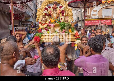 During the 9-day Brahmotsavam festival of Fanaswadi Temple in Bhuleshwar,  Mumbai, India, Hindus carry a palanquin with a figure of god Venkateshwara  Stock Photo - Alamy