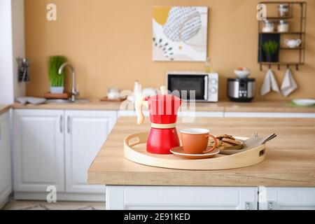 https://l450v.alamy.com/450v/2e91ked/tray-with-cezve-cup-of-coffee-and-cookies-on-kitchen-counter-2e91ked.jpg