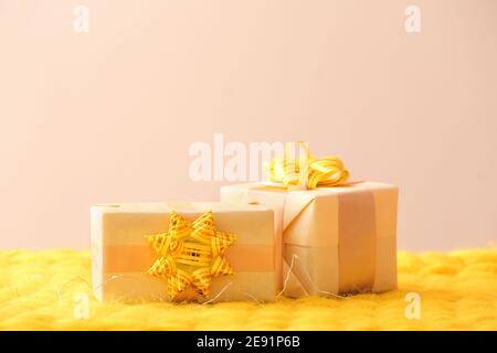 Gift boxes on knitted plaid Stock Photo