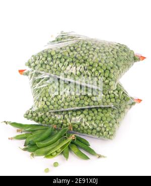 Composition with organic frozen vegetables on white background. Green peas in the package Stock Photo