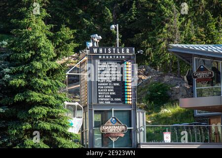Whistler, Canada - July 5,2020: View of Whistler Village Gondola with pine trees in the background Stock Photo