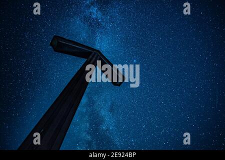 Arrow representing growth concept on starry sky background Stock Photo