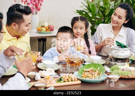 Family enjoying dinner Stock Photo