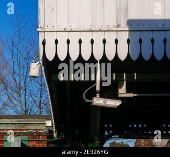 CCTV camera operated by TfL on a tube station platform in London. Stock Photo
