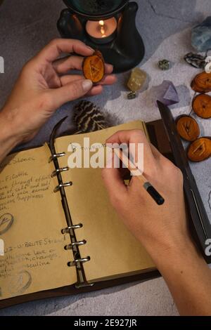 working with runes recording values Stock Photo - Alamy