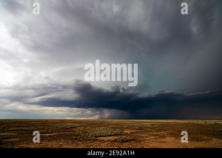 Stormy sky and threatening clouds from a supercell thunderstorm on the horizon near Roswell, New Mexico Stock Photo