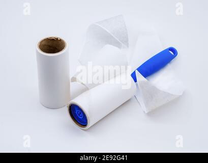 roller for cleaning clothes from wool, pet hair on clothes, Roller cleans clothes Stock Photo