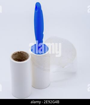roller for cleaning clothes from wool, pet hair on clothes, Roller cleans clothes Stock Photo