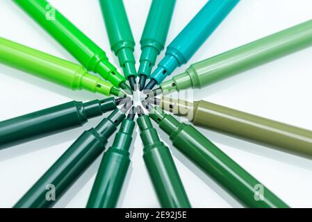 Close up of green colored felt-tip pens on isolated background. Selective  focus. Different shades of green. Concept of taking care of ecology and  envi Stock Photo - Alamy