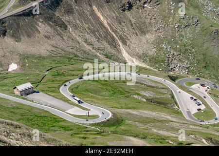 Vehicles on serpentine high alpine road on Grossglockner mountain in Austria Stock Photo