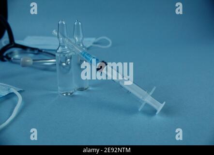 vaccination vaccinated syringe and two vials with lekarts vaccine on a ...