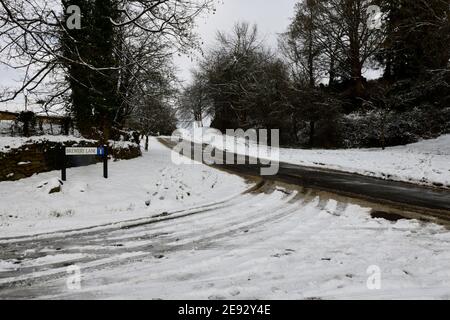 Entrance to Brewery Lane Hook Norton Village with Snowfall Stock Photo