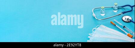 Long banner with medical utensils for an advertising header on the website of medical services, clinics, health insurance. Medical supplies on a blue Stock Photo