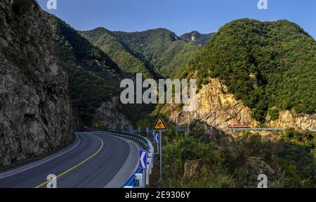 Pierce the clouds and mist to 209 national road across the western funiu area Stock Photo