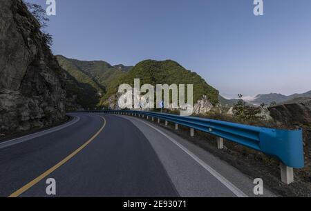 Pierce the clouds and mist to 209 national road across the western funiu area Stock Photo