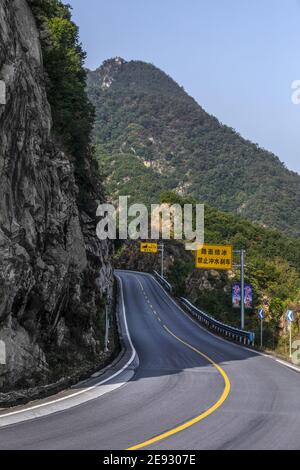 Pierce the clouds and mist to 209 national road across the western funiu area Stock Photo