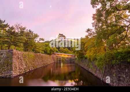 Sunset view of the Wakayama castle and the Ohashirouka Covered Bridge, in Wakayama City, Japan