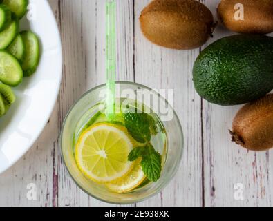 Food and drink, healthy dieting and nutrition, lifestyle, vegan, alkaline, vegetarian concept. Green smoothie with organic ingredients, vegetables on Stock Photo