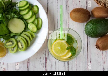 Food and drink, healthy dieting and nutrition, lifestyle, vegan, alkaline, vegetarian concept. Green smoothie with organic ingredients, vegetables on Stock Photo
