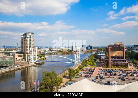 United Kingdom, England, Greater Manchester, Manchester, Salford, View of Salford Quays looking over Imperial War Museum North towards Lowry theatre f Stock Photo