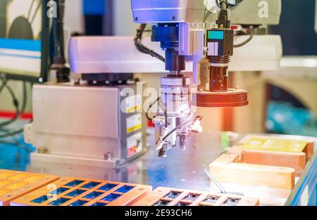 Vision measuring instrument inspecting PCB circuit board Stock Photo