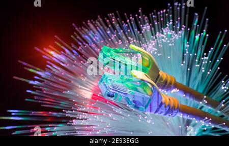 network cables with fiber optical background Stock Photo