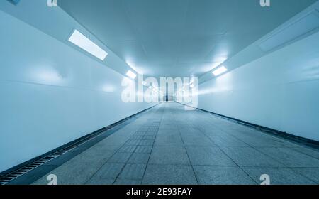 dark pedestrian tunnel is empty and empty. Stock Photo