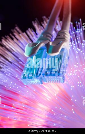 network cables with fiber optical background Stock Photo