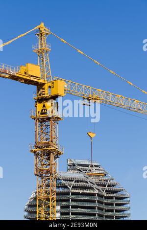 Russia. Moscow. Construction machinery. The work of cranes in construction. Stock Photo