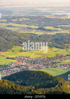 View over the foothills of the Chiemgau Alps and town Aschau in Upper Bavaria. Europe, Germany, Bavaria Stock Photo