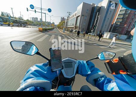 Using a mobile phone navigation dispatcher Stock Photo