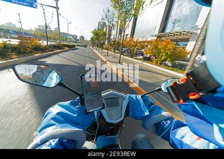 Using a mobile phone navigation dispatcher Stock Photo