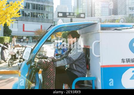 Work on the way driving tricycle Courier Stock Photo