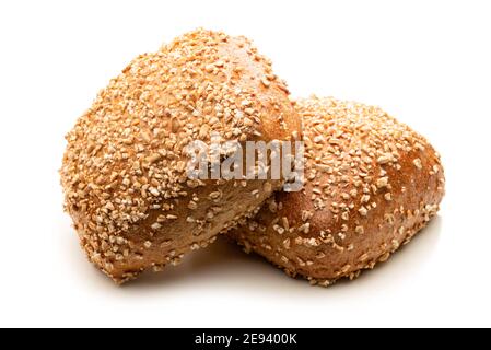 Two wholemeal bread rolls from spelt isolated against white background Stock Photo