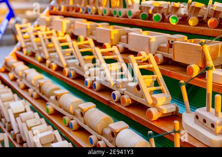 Children's eco handmade vintage wooden toys various models of train, truck, car, vehicle. Stock Photo