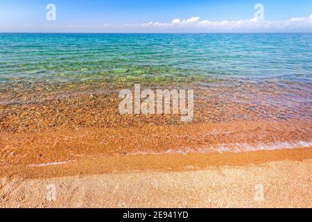 Clear waters of lake Issyk-Kul in Kyrgyzstan Stock Photo