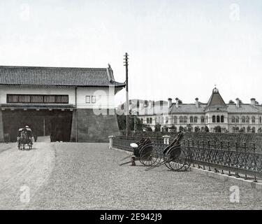 Late 19th century photograph - Imperial Palace, Tokyo, entrance gateway, rickshaws.