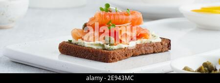 Smorrebrod - traditional Danish sandwiches. Long width banner for web sign. Stock Photo