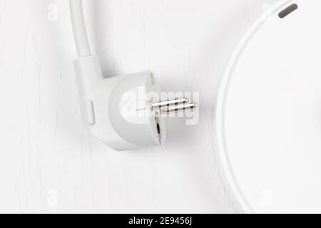 Electric kettle with stand isolated on white background. Electric cord with  plug Stock Photo - Alamy