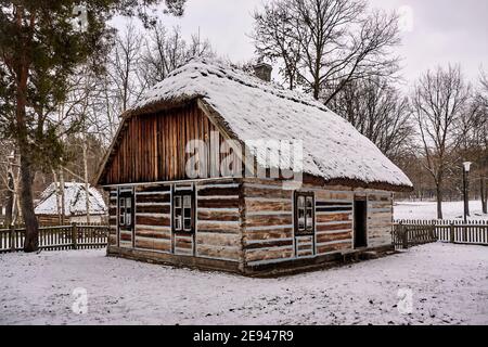 Radom, Poland -  January 15, 2021. Old wooden farm cottage from Jastrzebia village in Radom Village Museum. Stock Photo