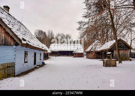 Radom, Poland -  January 15, 2021. Old wooden cottage from Chomentow village exhibited in Radom Village Museum. Stock Photo