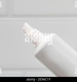 close-up on a tube of cream or white toothpaste Stock Photo