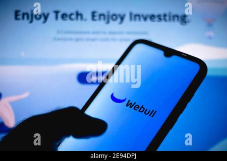 In this photo illustration the Webull Financial, logo seen displayed on a smartphone screen. Stock Photo