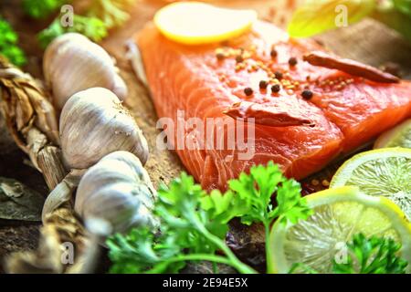 healthy delicious salmon with salt, lemon and salad Stock Photo