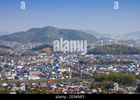 Himeji City, Japan. Cityscape seen from surrounding mountains. Stock Photo