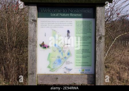 Notice board showing information and map of Nosterfield nature reserve, owned and managed by the Lower Ure Conservation Trust. North Yorkshire, UK Stock Photo