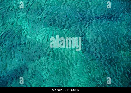 Beautiful turquoise sea surface, nature background, emerald color background Stock Photo