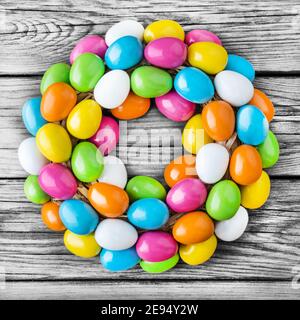 Easter eggs decoration against wooden background Stock Photo