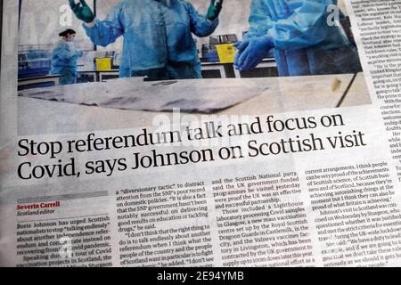 'Stop referendum talk and focus on Covid, says Johnson on Scottish visit' Guardian news newspaper headline inside page 29 January 2021 in London UK Stock Photo