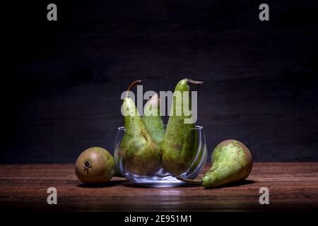 Composition of pears on wooden table. Healthy food concept. Stock Photo